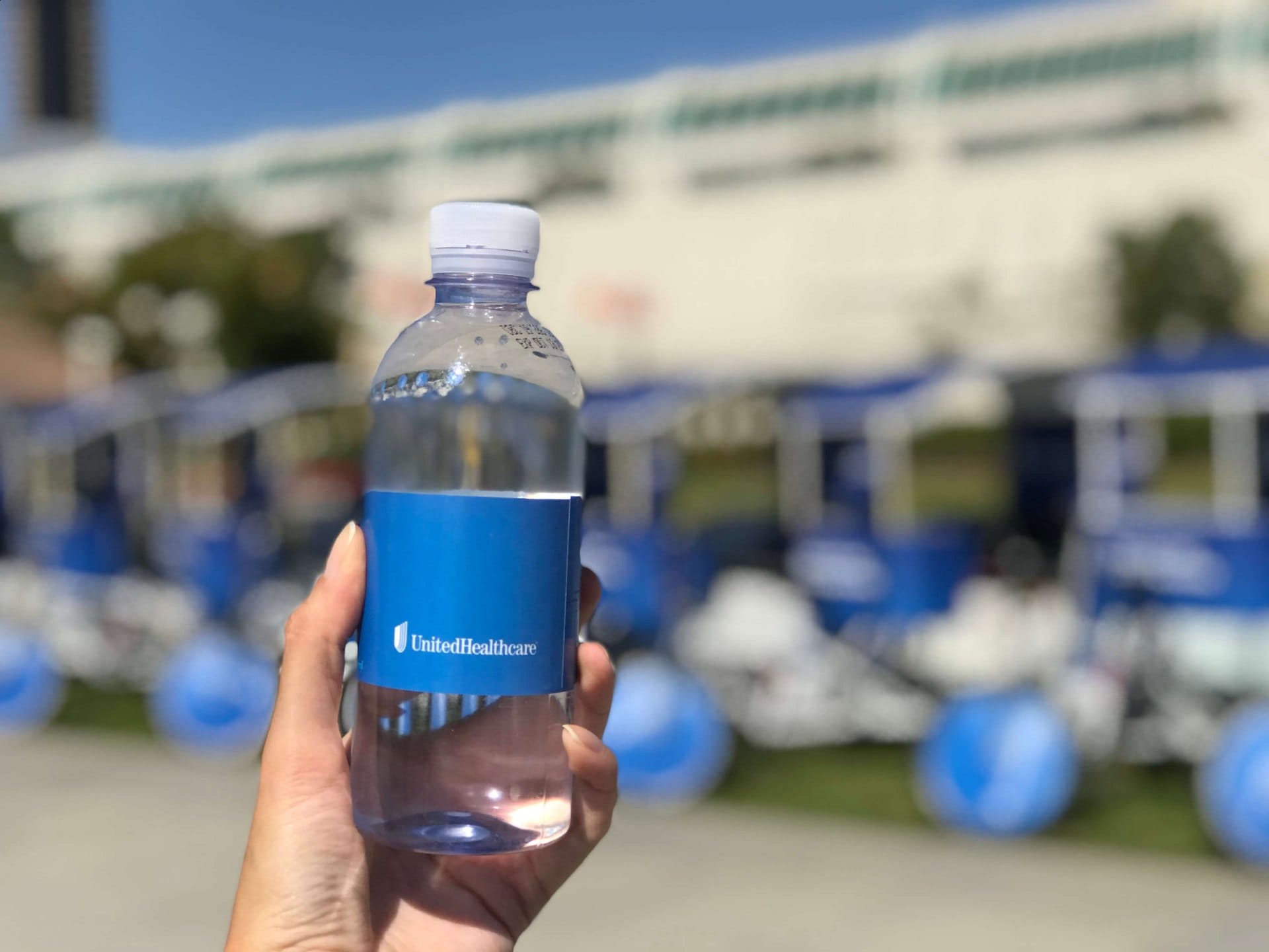 Branded water bottle at UnitedHealthcare pedicab convention event