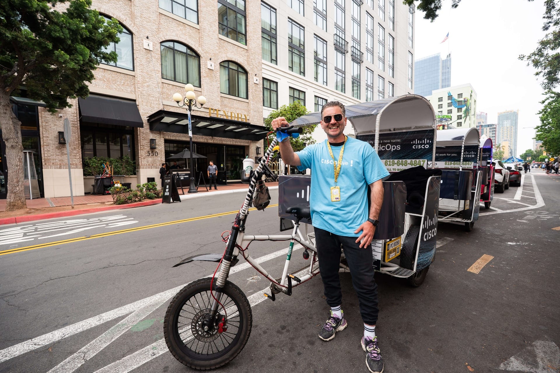 Cisco Live pedicab driver posing at Pendry Hotel San Diego