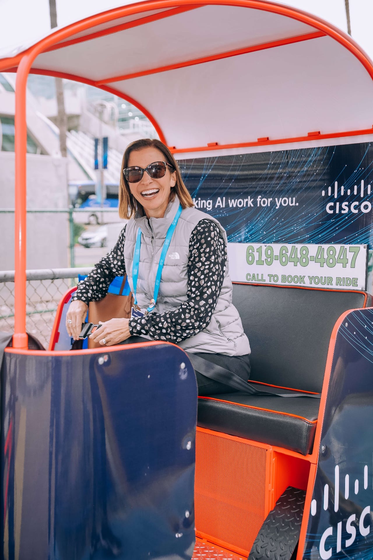 Cisco pedicab happy passenger at convention