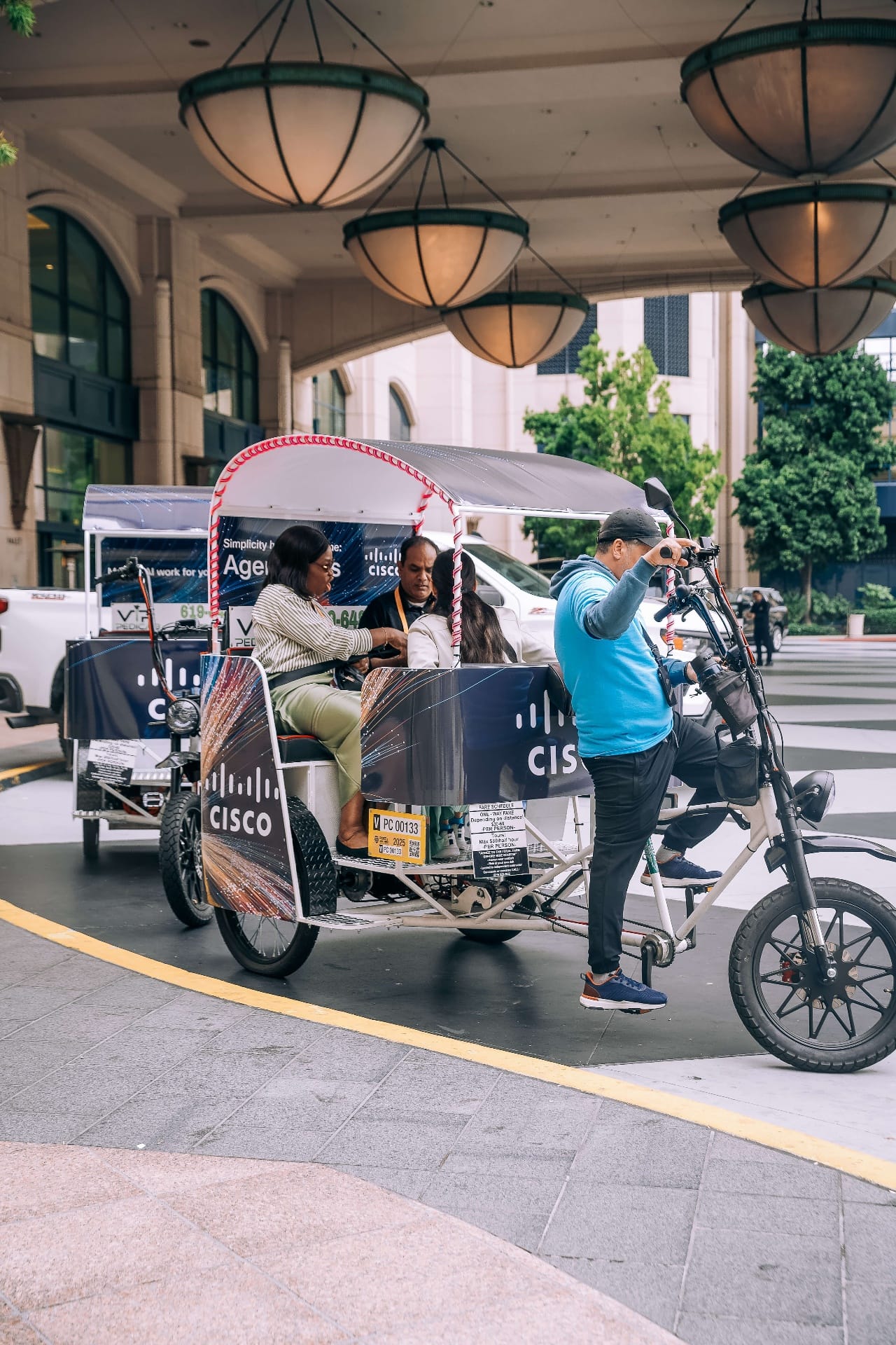 Cisco pedicab passengers hotel pickup in downtown San Diego