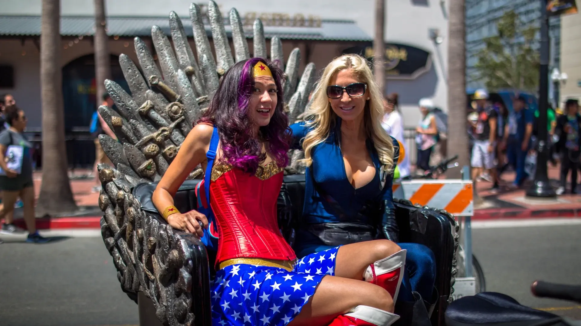 Cosplay Wonder Woman on Iron Throne pedicab at Comic-Con