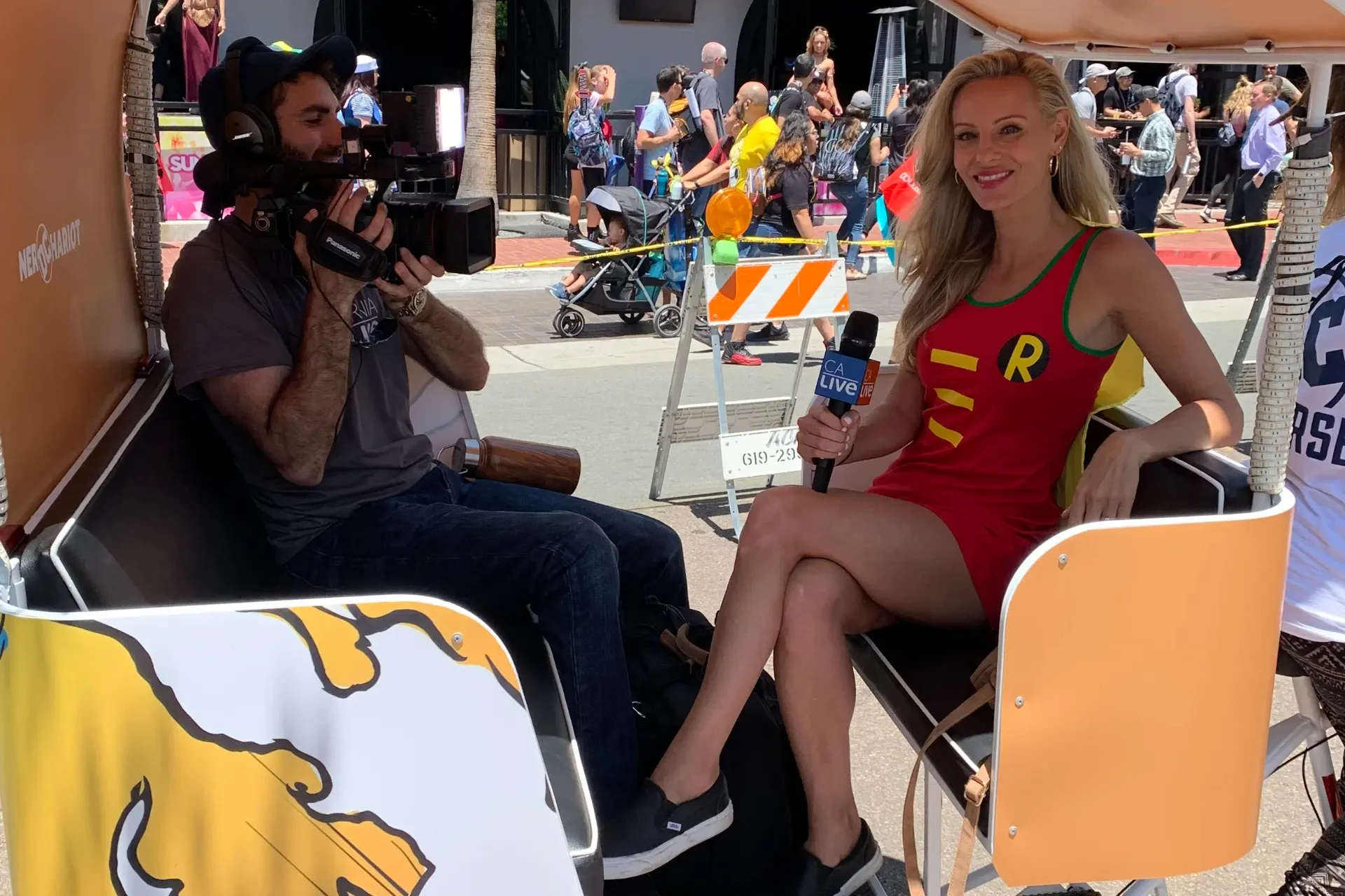 DC Nerd Chariot pedicab Robin cosplay TV interview Comic-Con