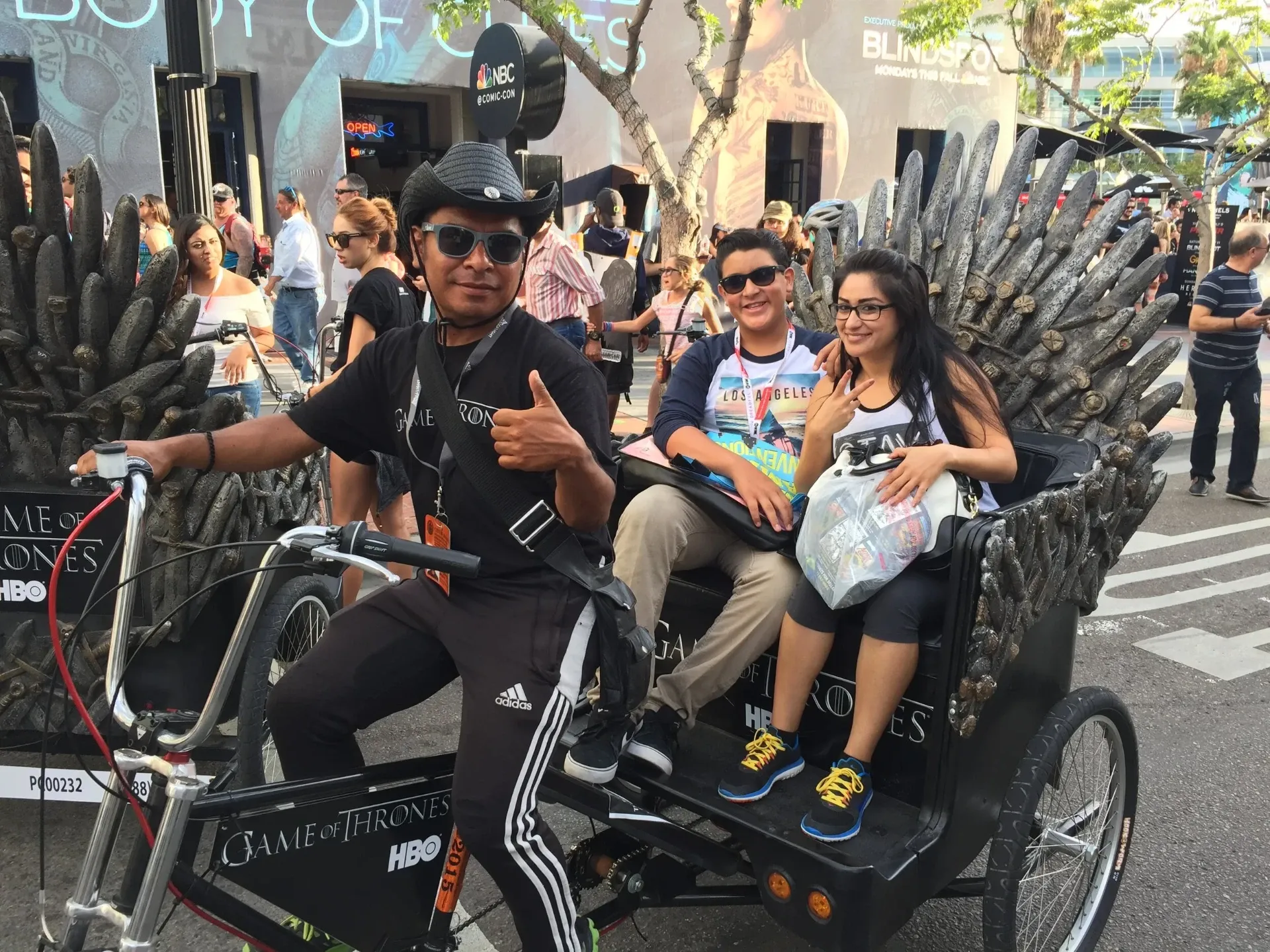 Game of Thrones HBO pedicab driver and passengers thumbs up Comic-Con