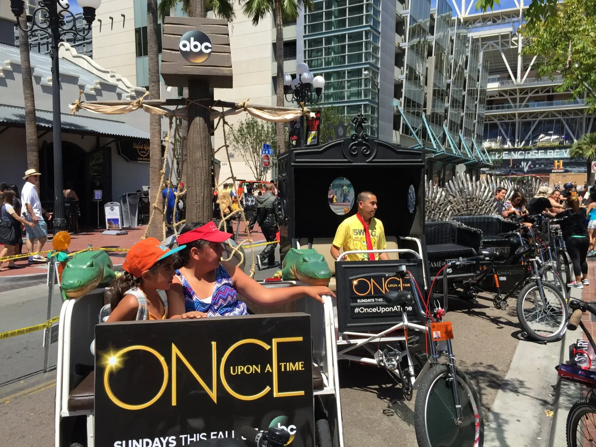 Once Upon a Time pedicab kids riding through Gaslamp Comic-Con