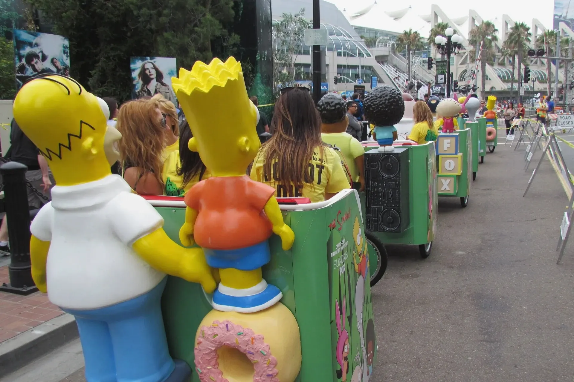 Simpsons Fox pedicab fleet with character statues Convention Center Comic-Con