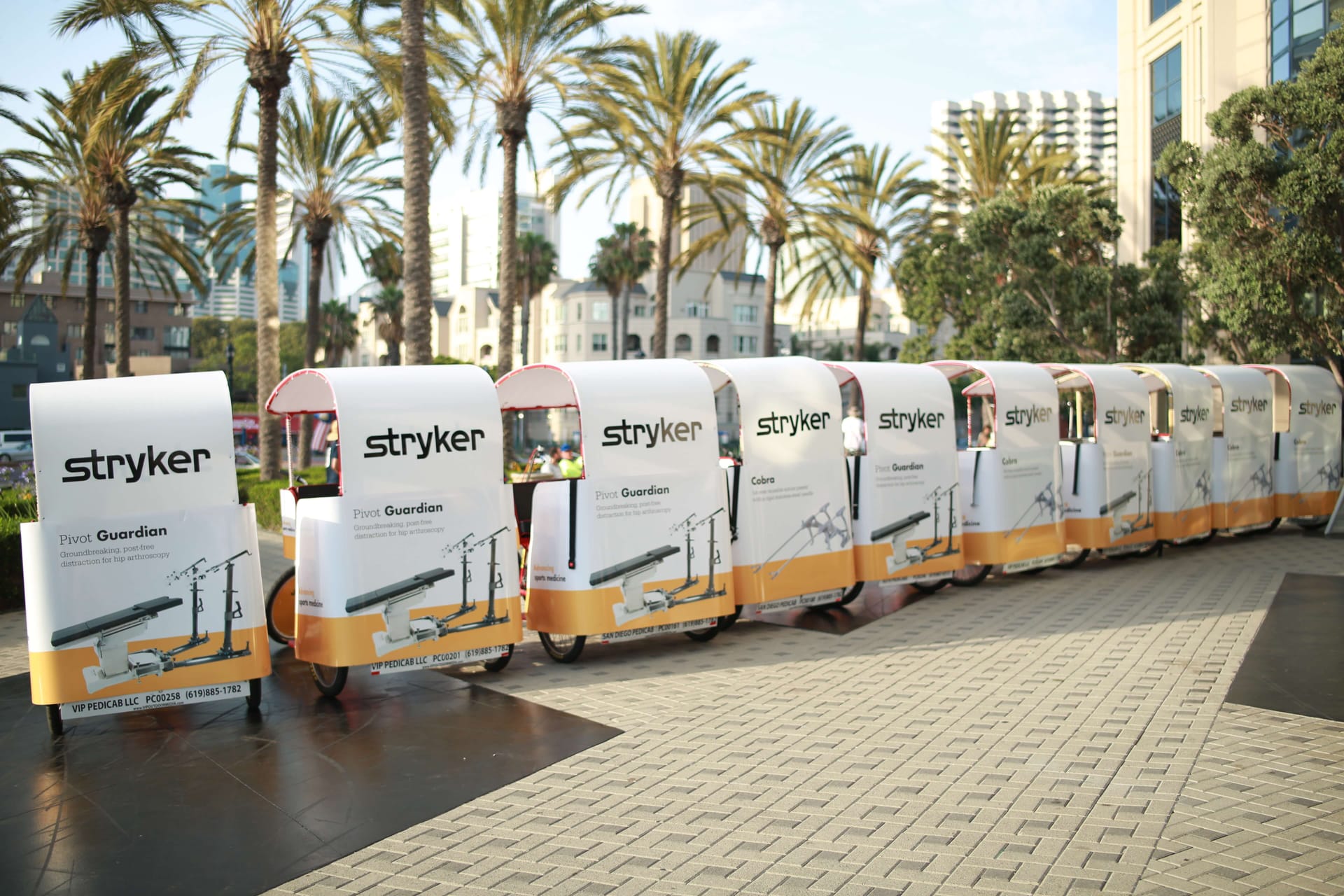 Stryker Pivot Guardian branded pedicab fleet at a San Diego medical conference