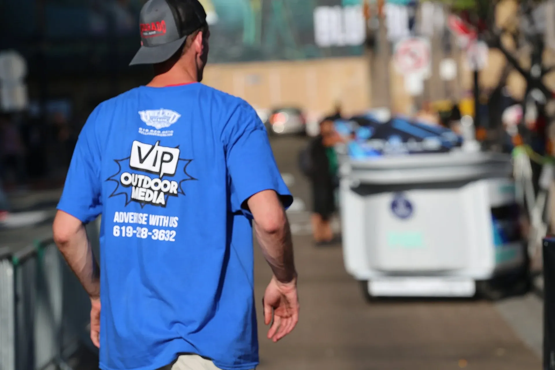 VIP Outdoor Media driver in branded shirt at Comic-Con